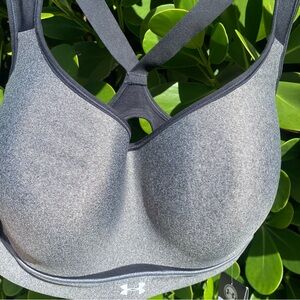Under Armour womens high impact black sports bra, size 36DD. New with tags.